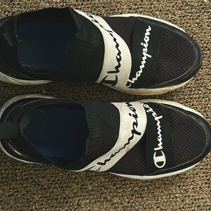 Black and silver Champion shoes